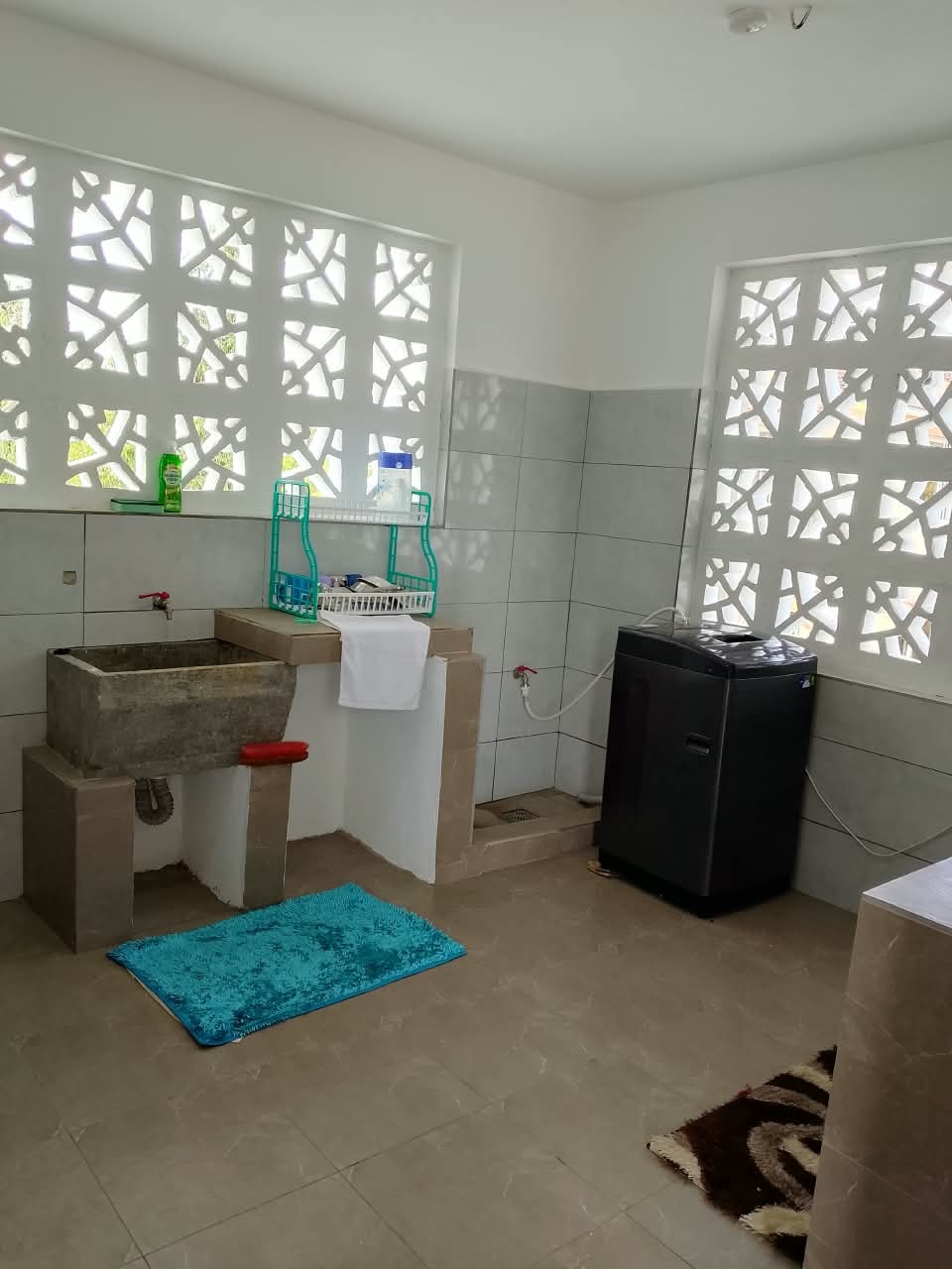 The shared laundry area at @Dawn's Ville